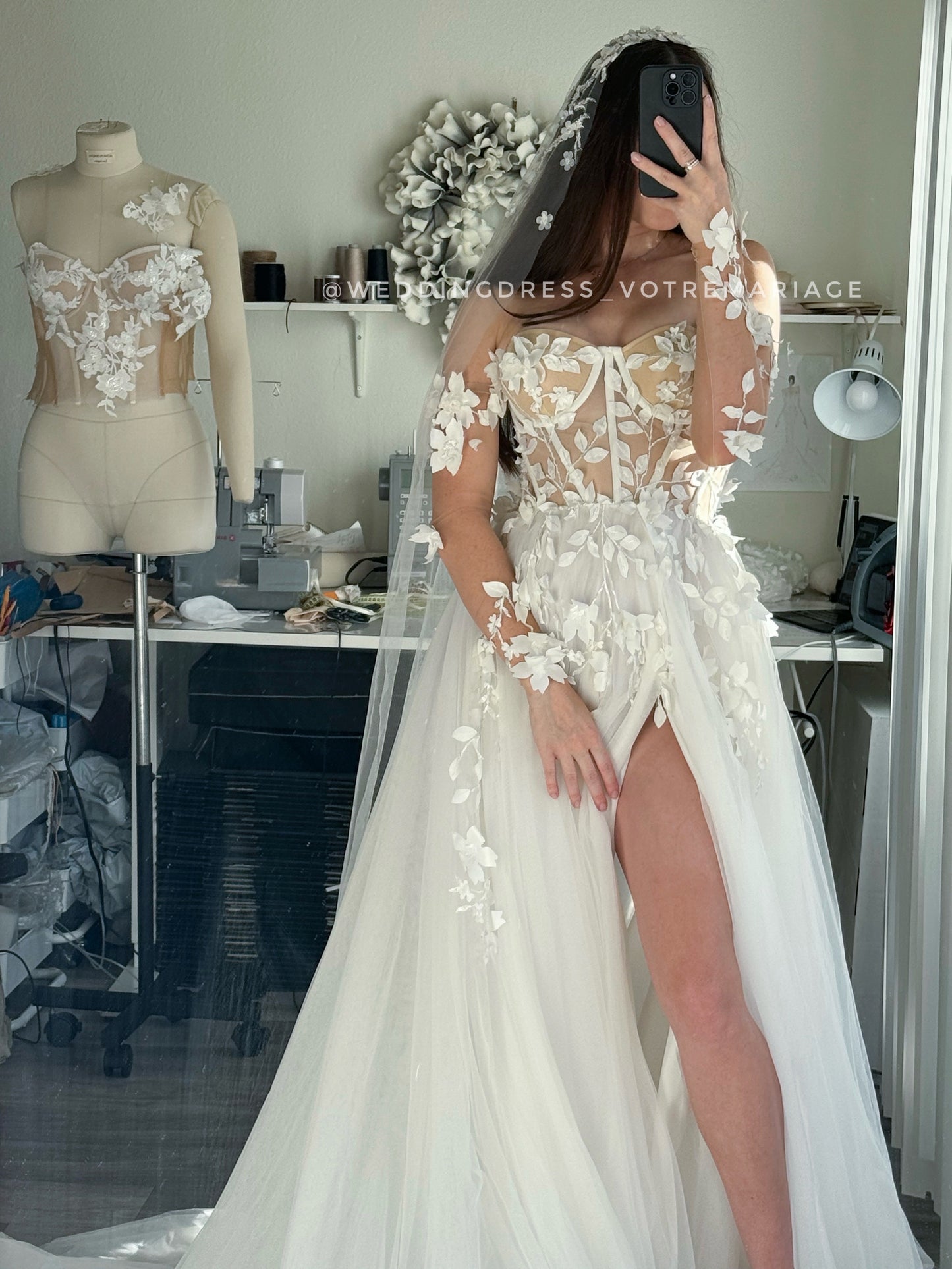 Angelina/ off-white wedding dress with a deep slit and train