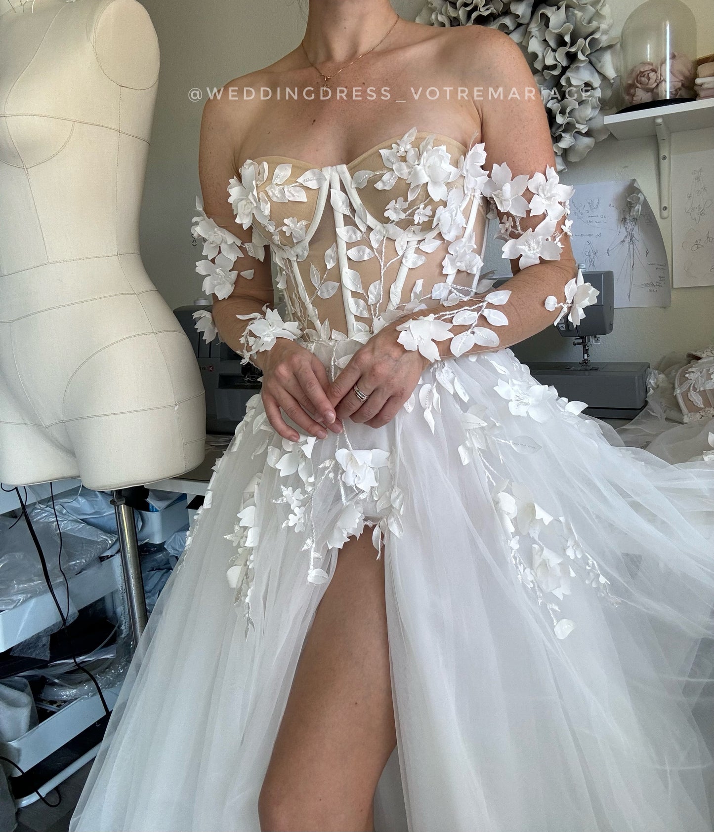 Angelina/ off-white wedding dress with a deep slit and train