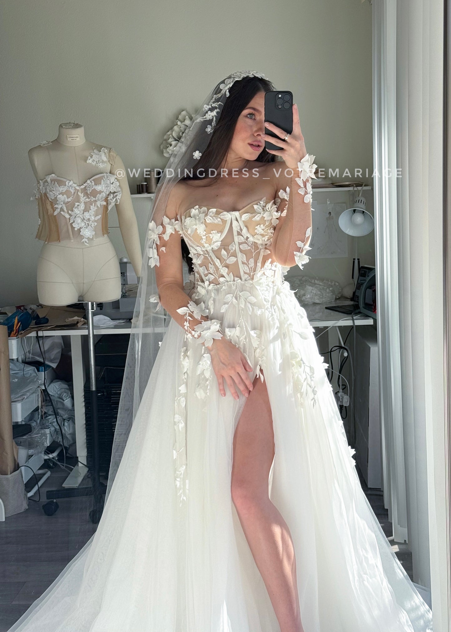 Angelina/ off-white wedding dress with a deep slit and train