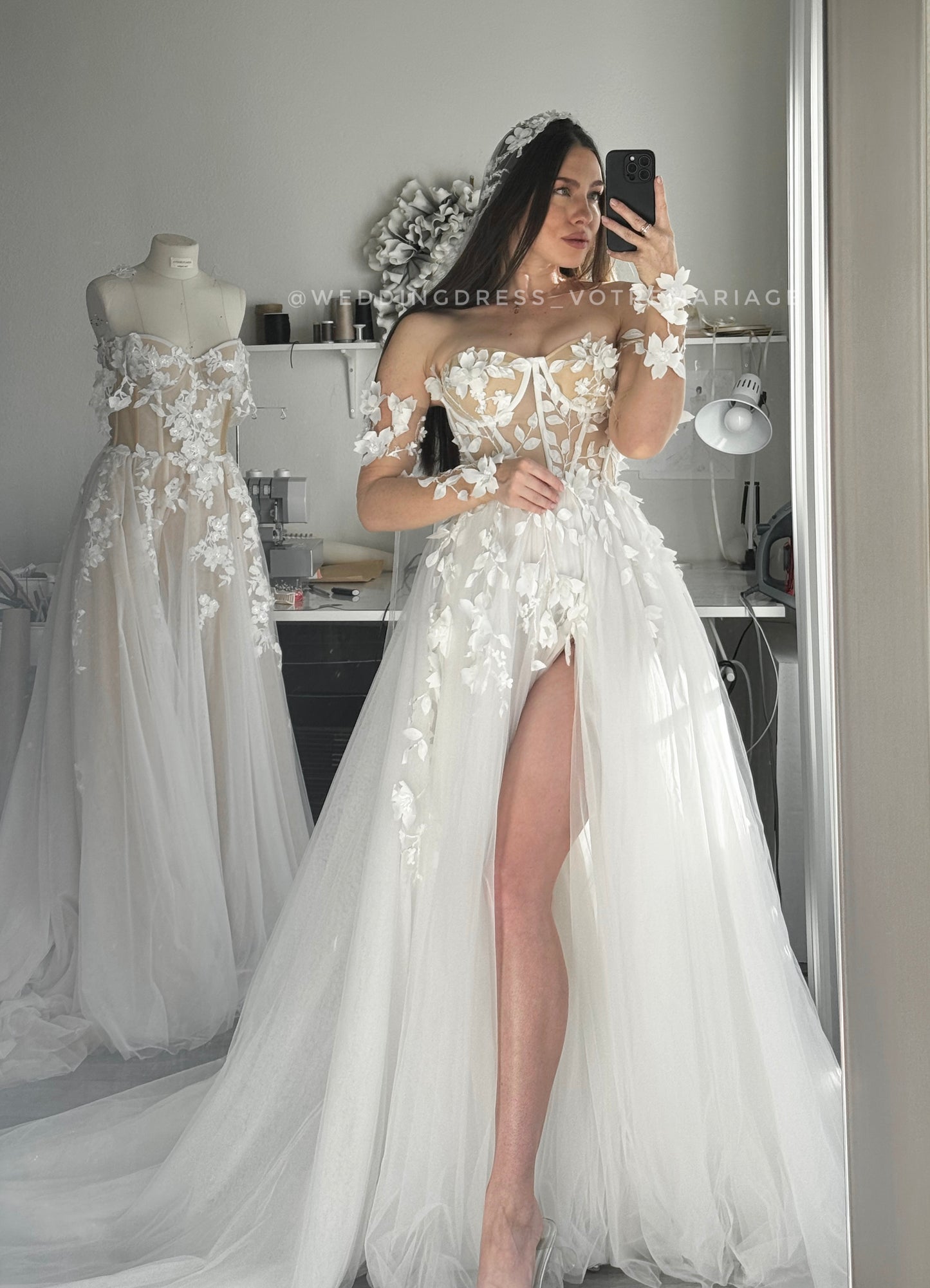 Angelina/ off-white wedding dress with a deep slit and train