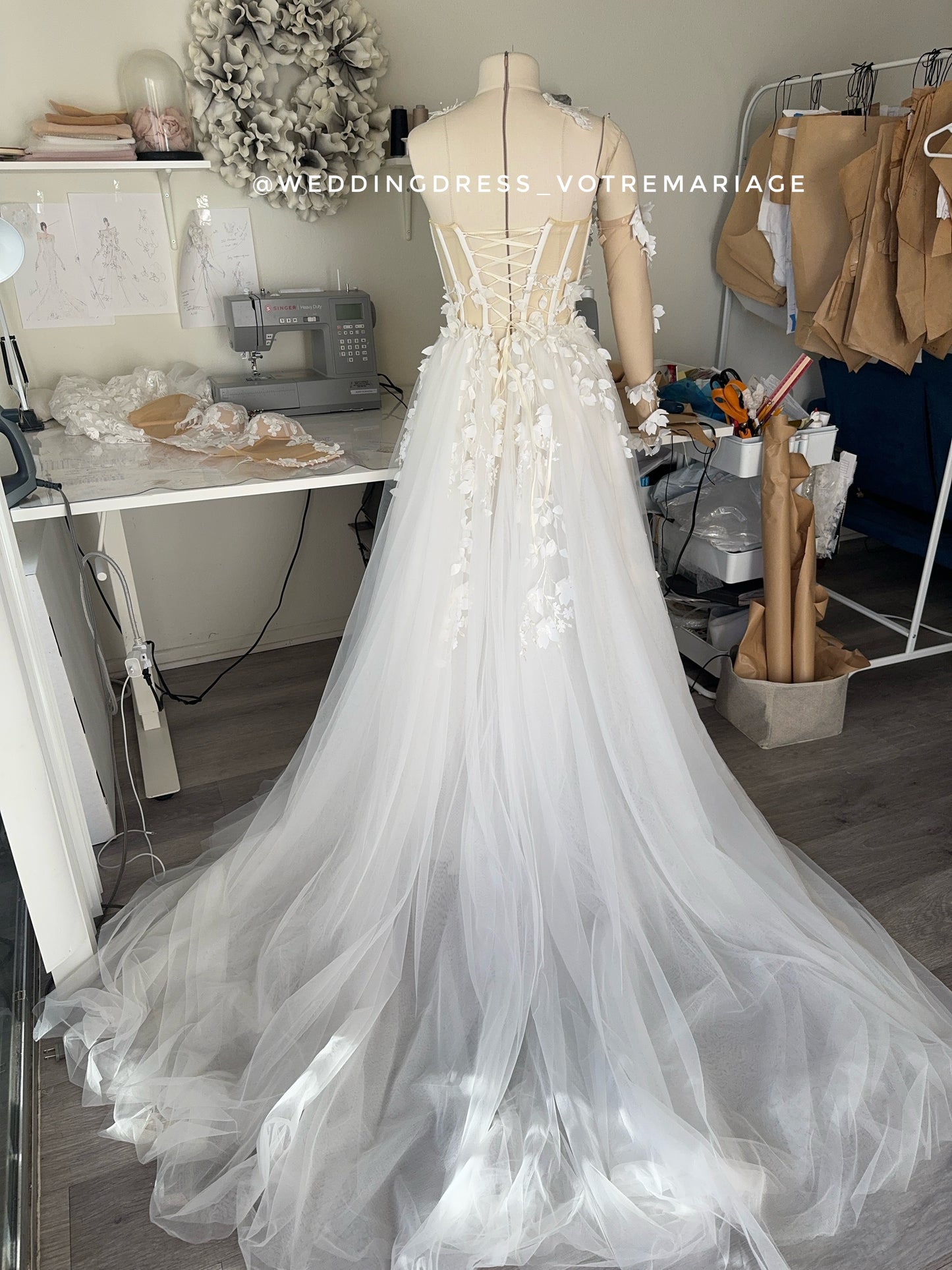 Angelina/ off-white wedding dress with a deep slit and train