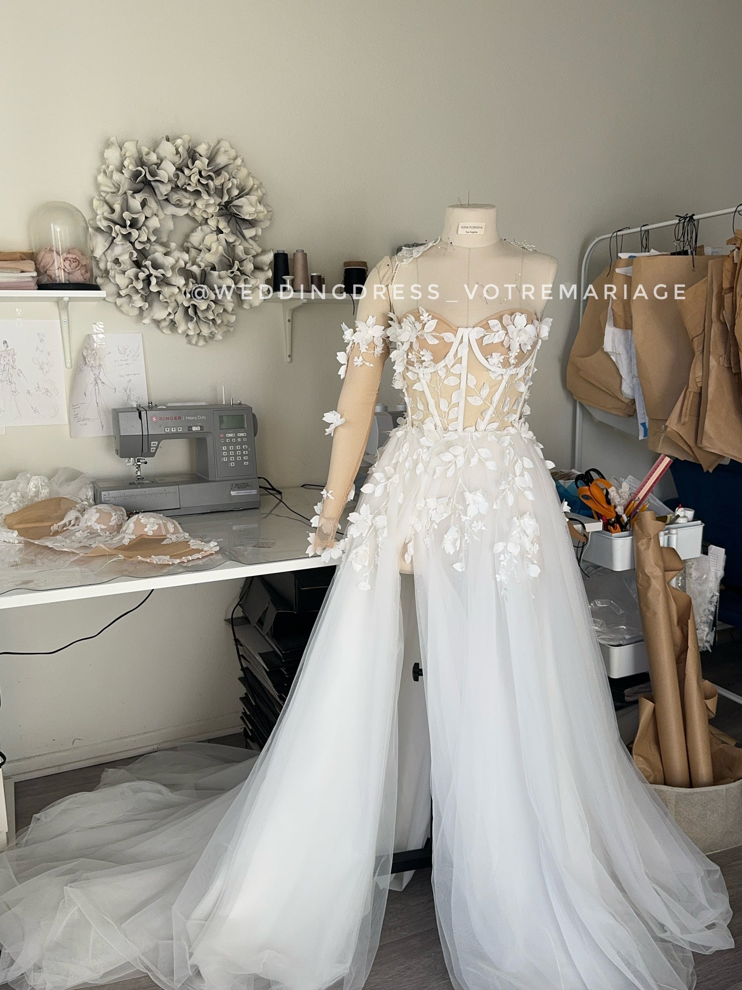 Angelina/ off-white wedding dress with a deep slit and train
