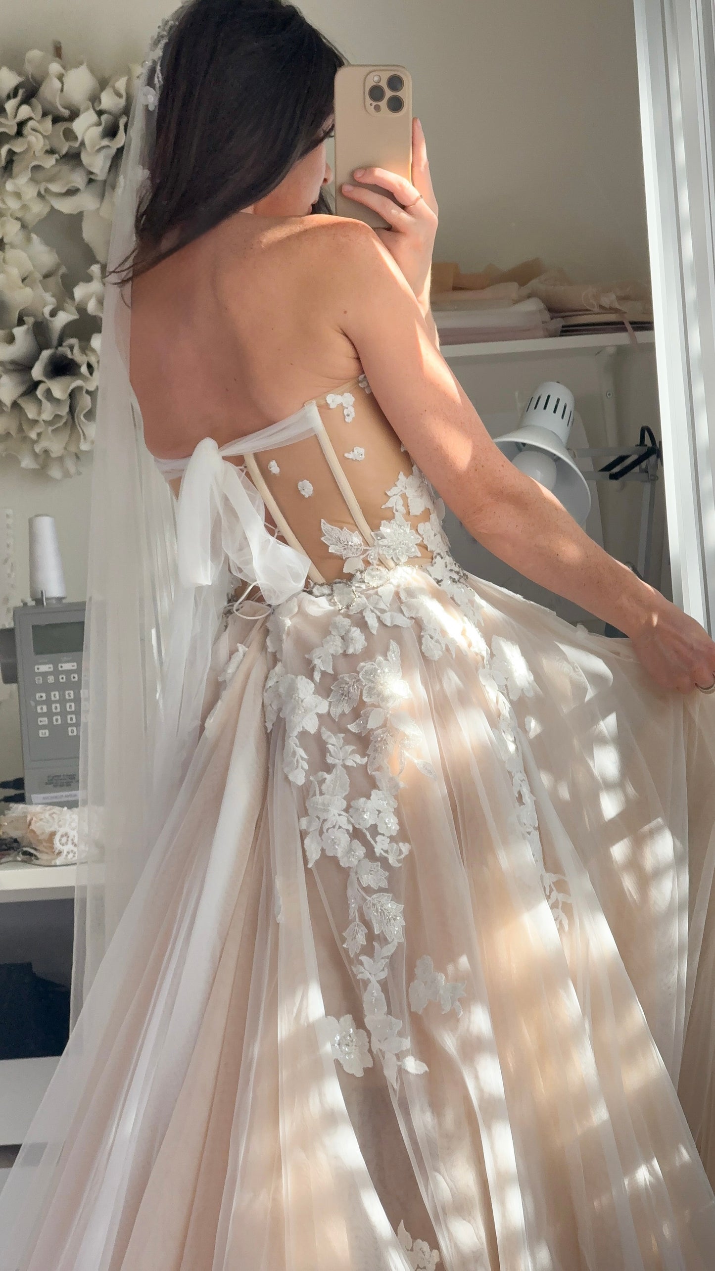Chloe / Corset A-line wedding dress in blush color with a train.