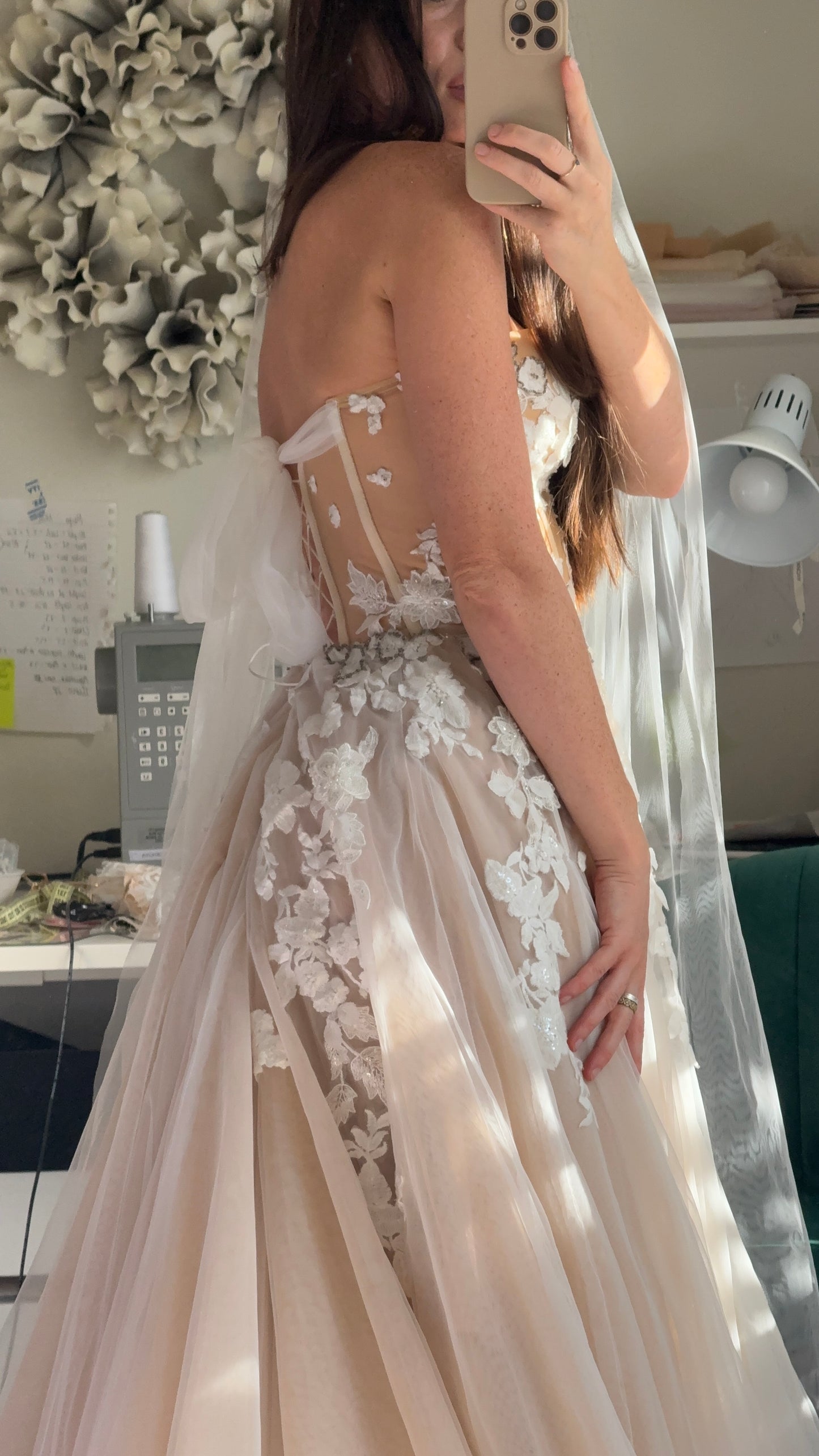 Chloe / Corset A-line wedding dress in blush color with a train.