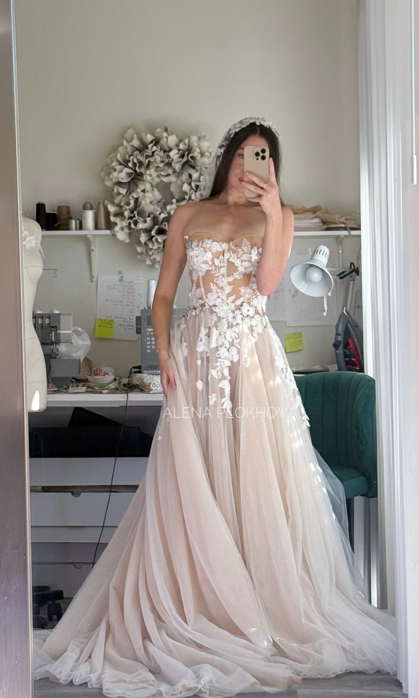 Chloe / Corset A-line wedding dress in blush color with a train.