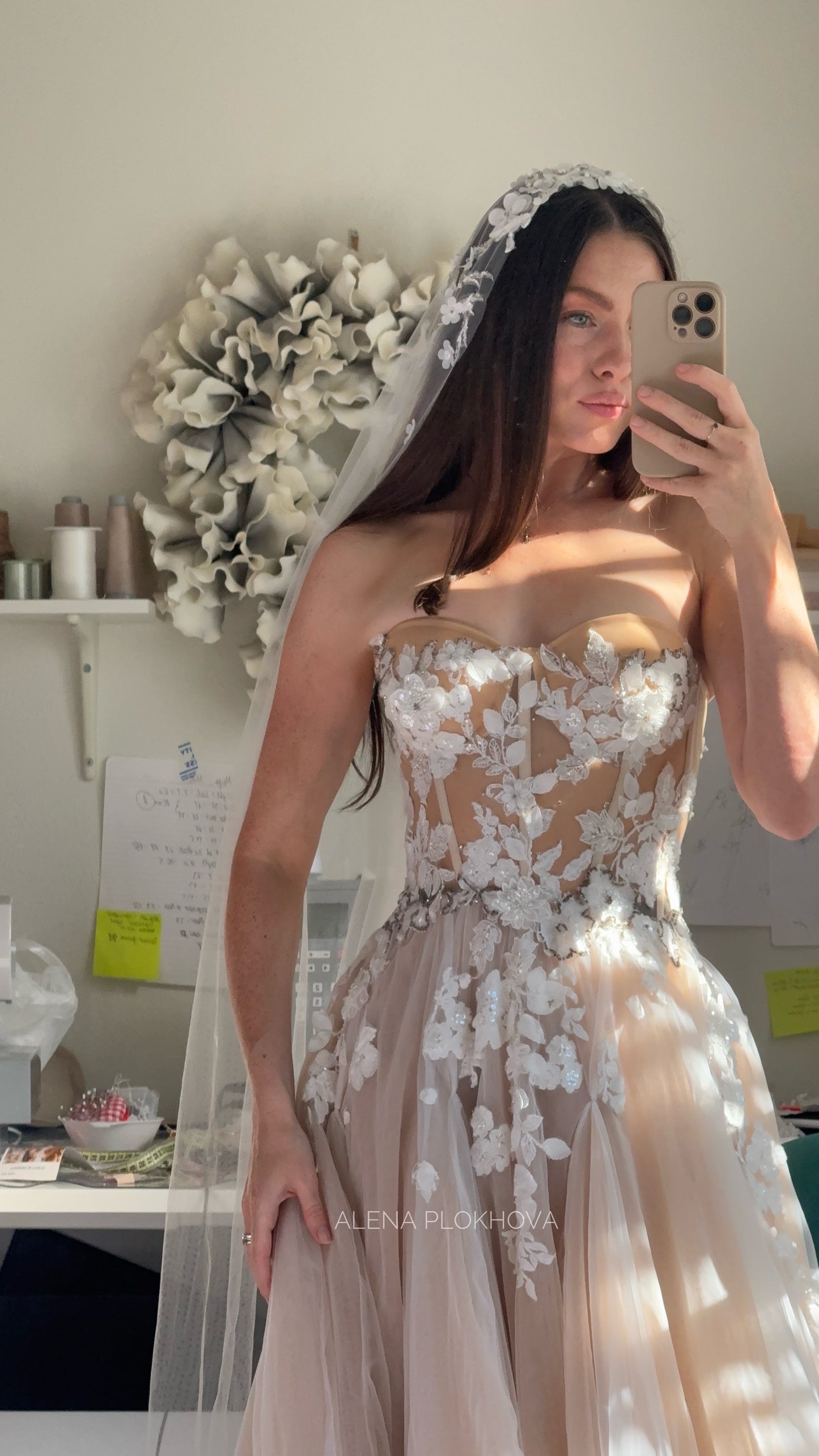 Chloe / Corset A-line wedding dress in blush color with a train.