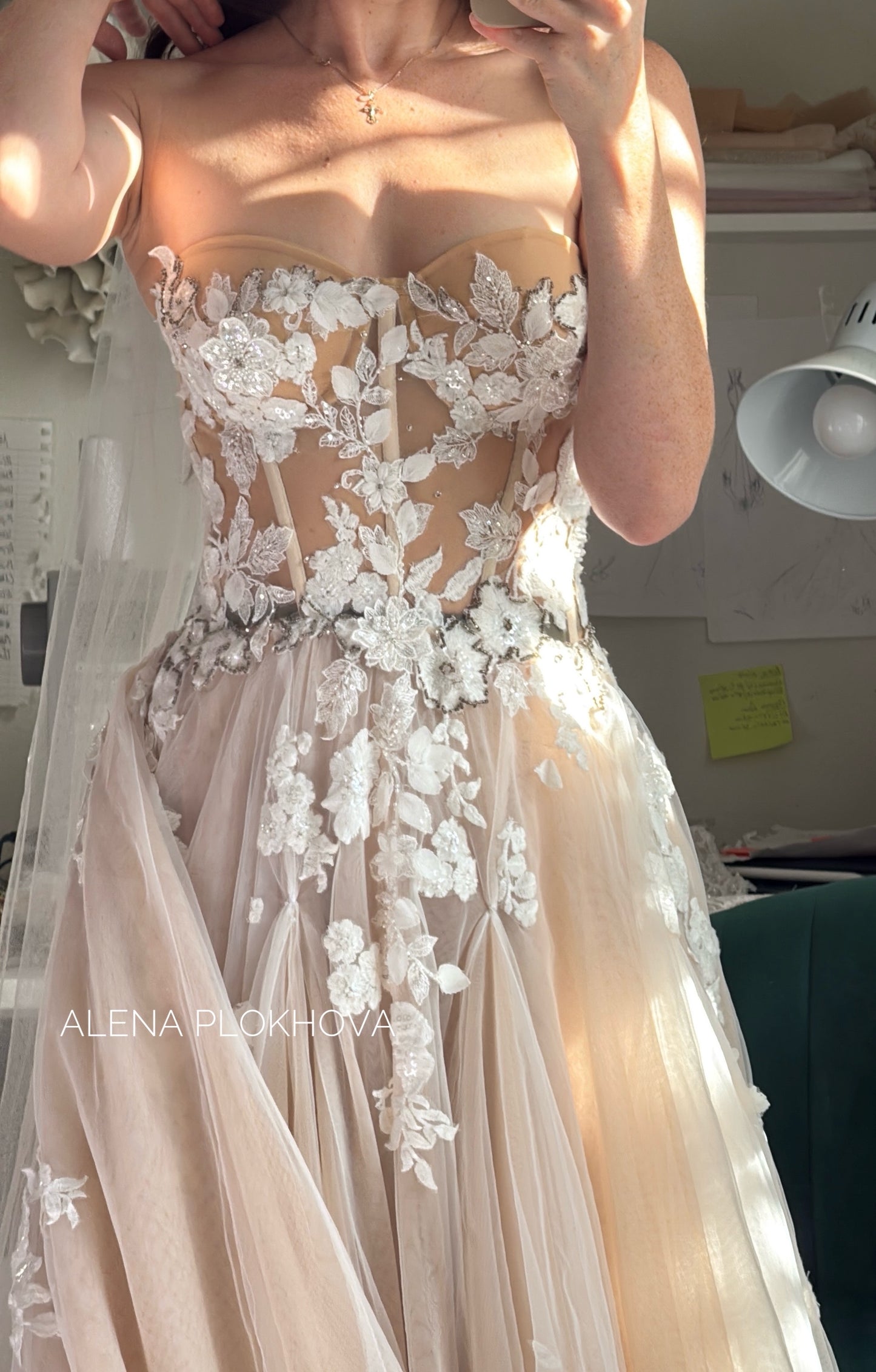 Chloe / Corset A-line wedding dress in blush color with a train.