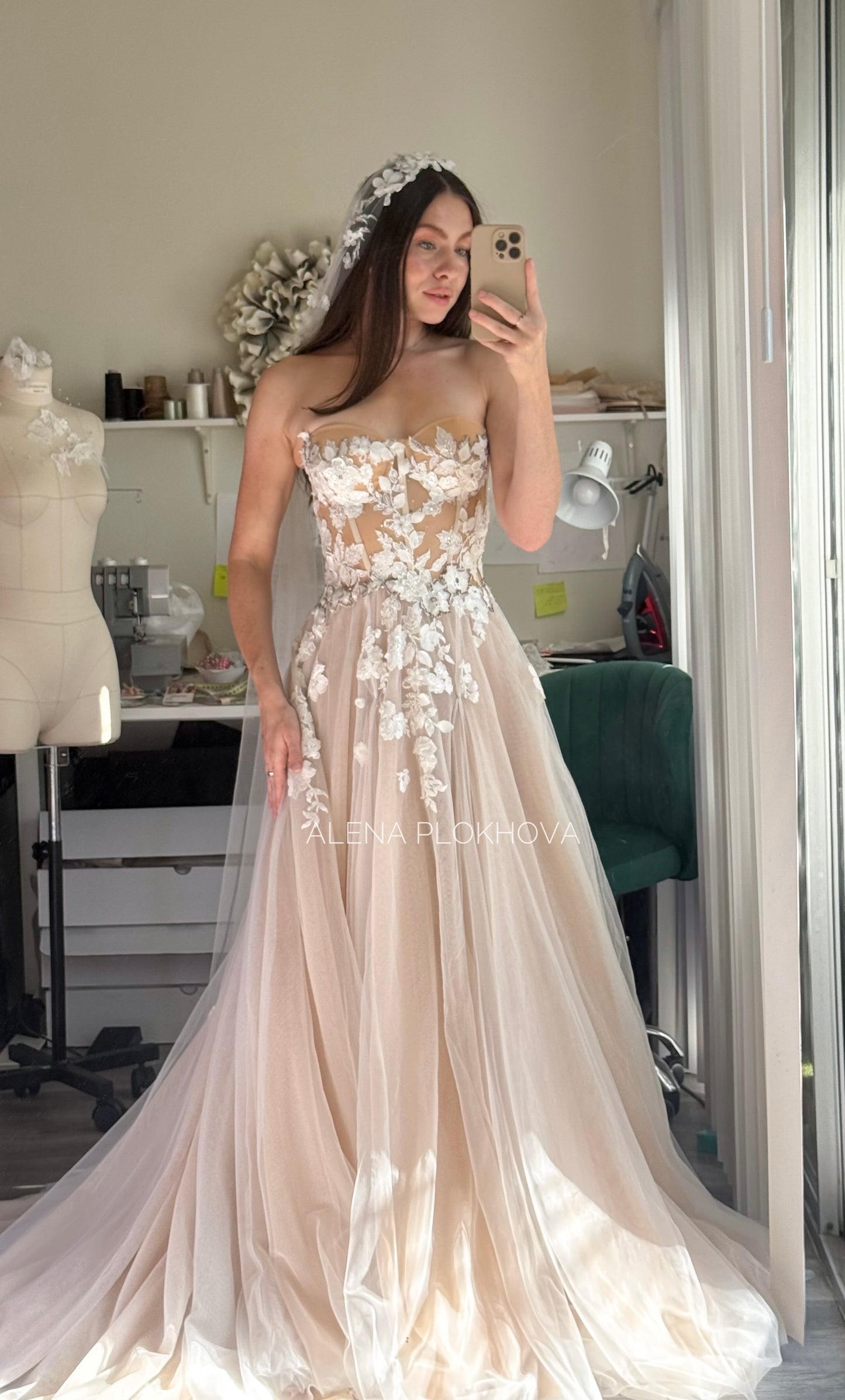 Chloe / Corset A-line wedding dress in blush color with a train.